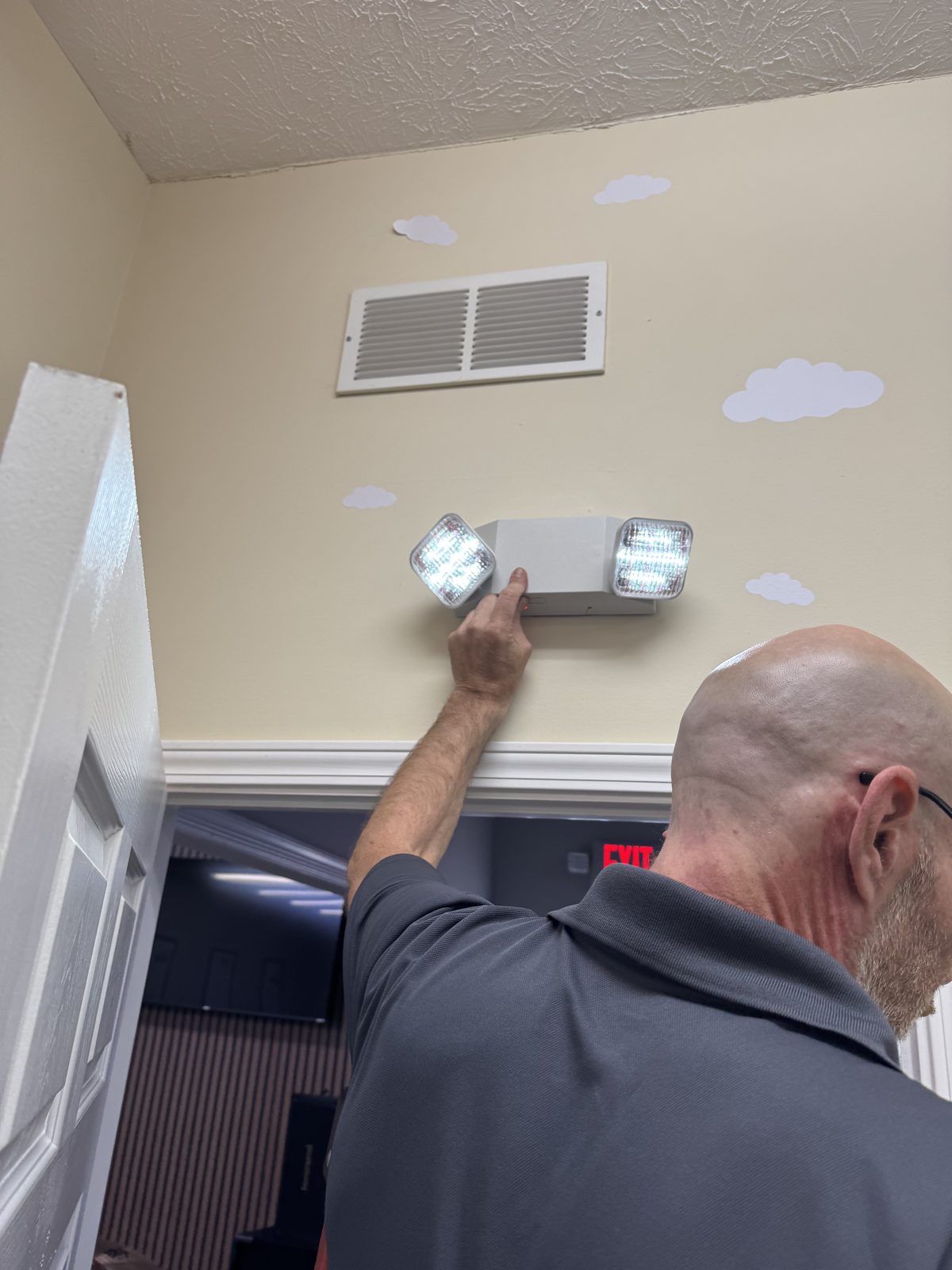 Combo exit sign and emergency light detail